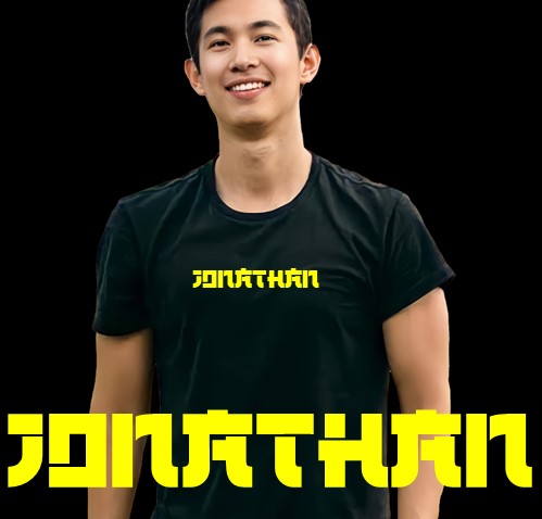 A model wearing a black t-shirt with lettering in yellow font color.